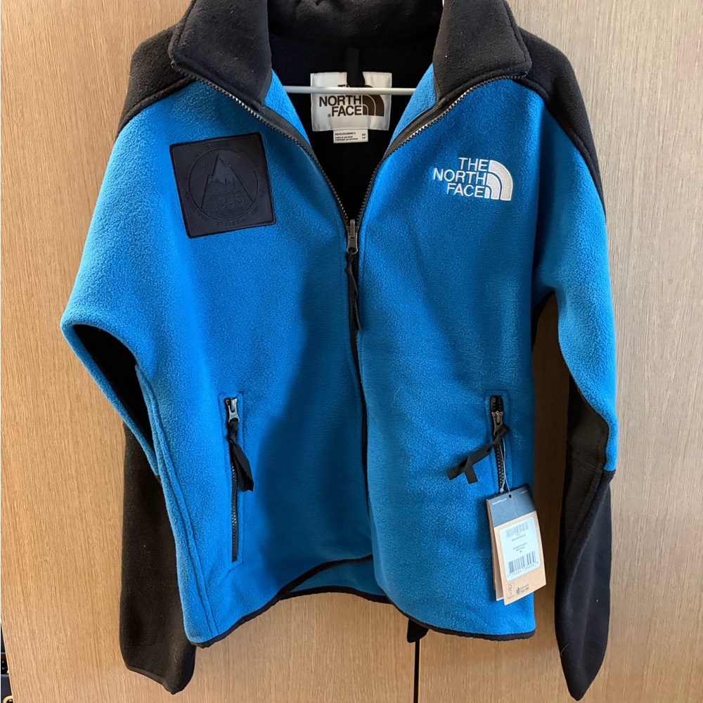 The North Face Bright Blue Fleece Jacket with Black Trim